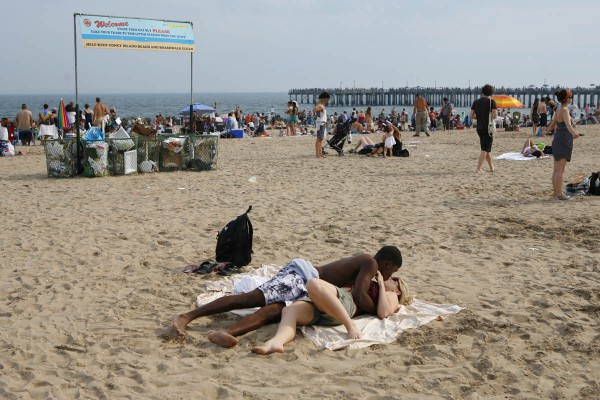 Interracial love on Coney Island Beach Interracial love on Coney Island Beach